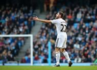 MANCHESTER, ENGLAND - NOVEMBER 22:  Angel Rangel of Swansea City gestures during the Barclays Premier League match between Manchester City and Swansea City at Etihad Stadium on November 22, 2014 in Manchester, England.  (Photo by Jan Kruger/Getty Images)